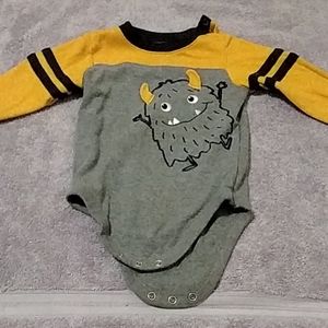 Long sleeve onesie with a monster